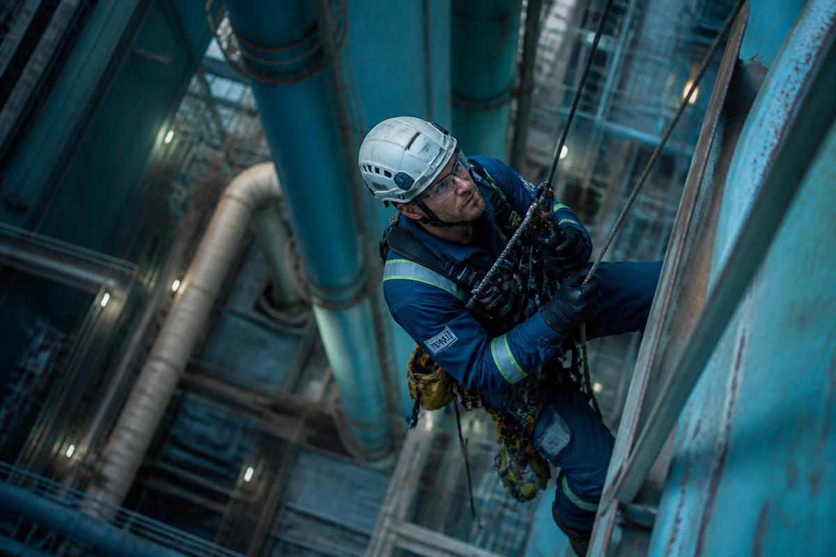 Industrial high angle rescue technician on ropes
